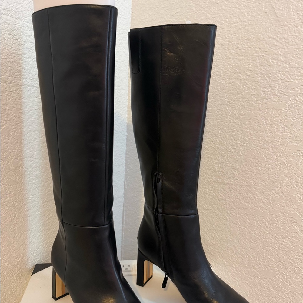 Sleek Black Leather Heeled Boots